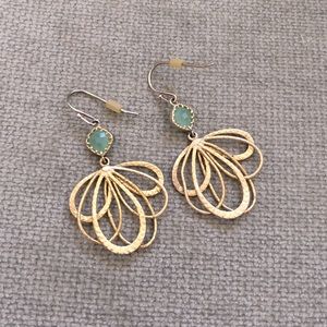 Gold tone earrings with green stone